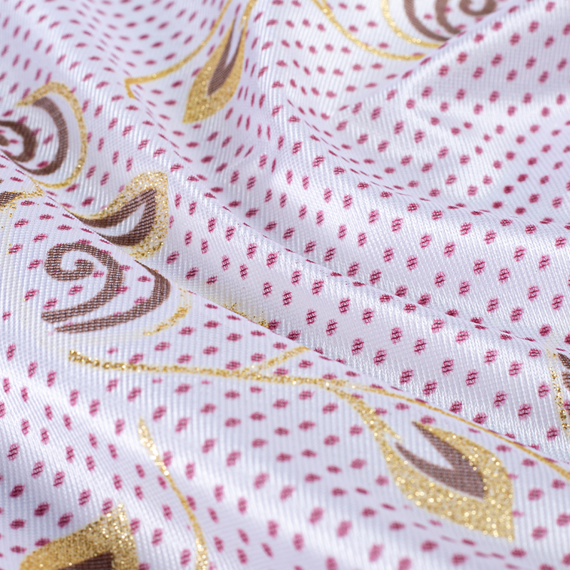 Tela de tricot estampada dorada