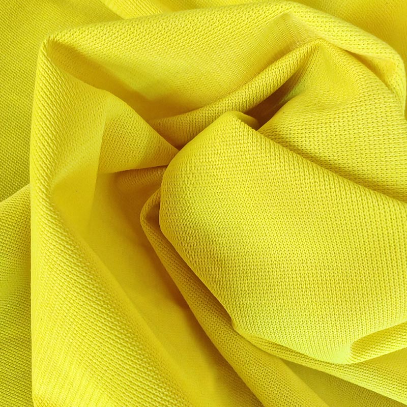 Tejido de tricot amarillo fluorescente de color sólido